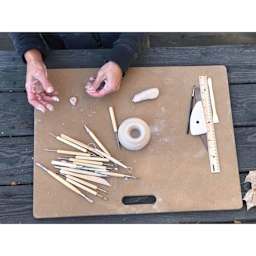 Penguin Pottery Portable Clay Wedging Board - 18" x 24", Large, Single Handle in use