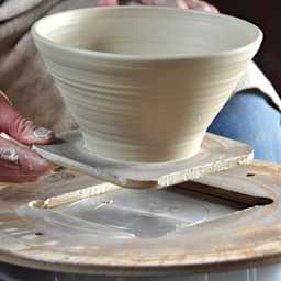 Penguin Pottery Heavy-Duty Bat System insert being removed with formed ceramic