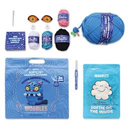 The Woobles Extra Squeezy Crochet Kit - Derpy the Tiger contents with packaging