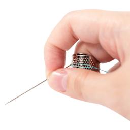 Clover Adjustable Ring Thimble being worn