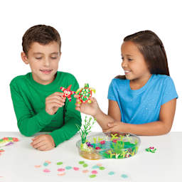 Glow In the Dark Turtle Lagoon Set - Children holding finished starfish and turtle