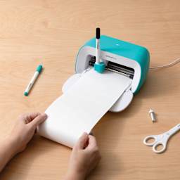 Cricut Joy Smart Label Dissolvable Paper, fed through machine (not included)