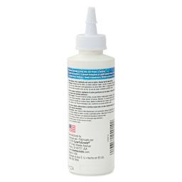 Aleene's Permanent Fabric Glue - 4 oz, back of the squeeze bottle