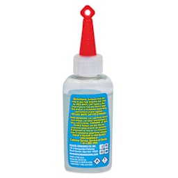 Beacon Zip Dry Paper Art Glue - 2 oz, back of the bottle