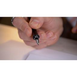 Tom's Studio The One Dip Wonder Ink Reservoir inserted in pen nib in hand (not included)