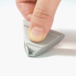 Object Index Mangaka Eraser - Triangular, in hand and in use