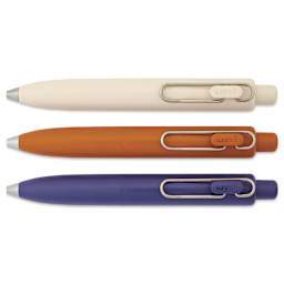 Uni-Ball One P. Retractable Gel Pens - Warm Colors, Pkg of 3, laid out with tips retracted