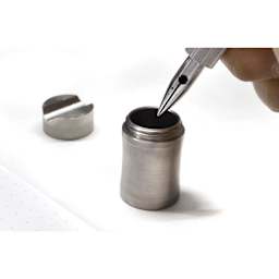 Colorverse Shuttle Stainless Steel Ink Barrel, dipping pen inside of the inkwell