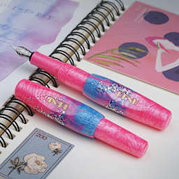 Benu Pixie Fountain Pen - Stardust Pink, pen laid out (image may show a different size nib)