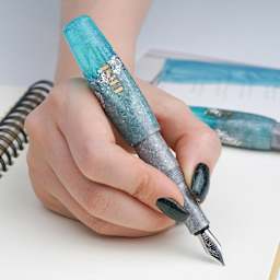 Benu Pixie Fountain Pen - Aqua Glow, in hand (image may show a different size nib)