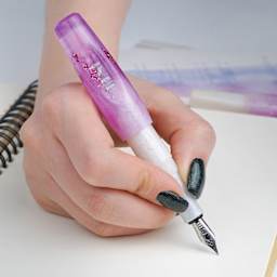 Benu Pixie Fountain Pen - Icy Violet, pen in hand (image may show a different size nib)