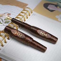Benu Pixie Fountain Pen - Coffee Brown, two pens laid out (image may show a different size nib)