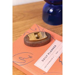 Makers Cabinet Hovel Walnut Base - 1/2" x 3" x 1-3/4", on desk