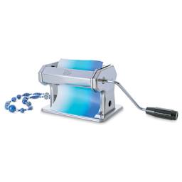 DAS Smart Clay Machine with clay being rolled through it