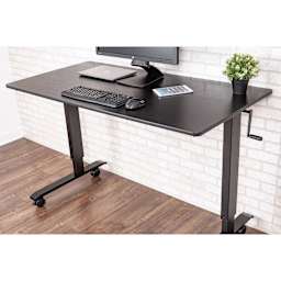 Luxor High Speed Crank Adjustable Stand Up Desk - Black Oak with Black Frame, 59" W - in office