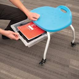 Stackable Classroom Stool with Wheels and Storage, demonstration of the bin under the stool.