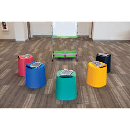 Luxor TailFin Plastic Stackable Stools, set of 5 shown in a classroom. 