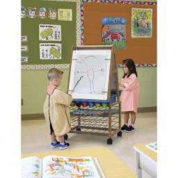 Copernicus Bamboo Double-Sided Art Center - Easel with Drying Rack, in classroom being used by children