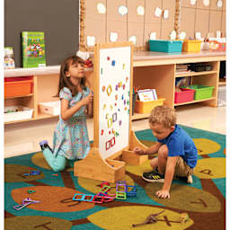 Copernicus Early Years Creator Center, children placing magnetic shapes on whiteboard in portrait mode