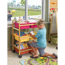 Copernicus Bamboo Book Browser Cart - Vibrant Warm, 6 Bins, child reaching inside bin