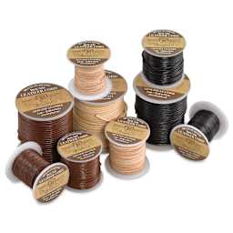 Hemptique Round Leather Cords, various sizes and colors laid out 