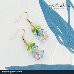 Tulip and Butterfly beads from the John Bead Crystal Lane DIY Glass Garden Bead Strand used to create earrings.