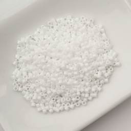 John Bead Cylin 11/0 Cylindrical Seed Beads - Chalk White sitting in dish