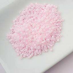 John Bead Cylin 11/0 Matte Macaron Cylindrical Seed Beads - Peal Pink sitting in dish