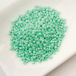 John Bead Cylin 11/0 Cylindrical Seed Beads - Seafoam Opaque sitting in dish