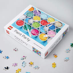 LEGO Paint Party 1,000 Piece Puzzle - Package surrounded by loose pieces