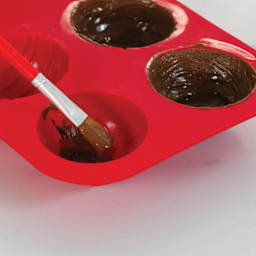 Handstand Kitchen Cocoa Bomb Mini Set (Applying cocoa inside mold)