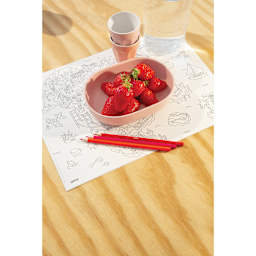 Omy Coloring Placemat Set - Atlas (placemat example on table with food and colored pencils)