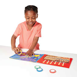 Melissa & Doug Tape Activity Book (Child using tape in activity book)