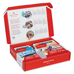 Caran d'Ache Creative Box Set, contents inside cardboard box with lid open