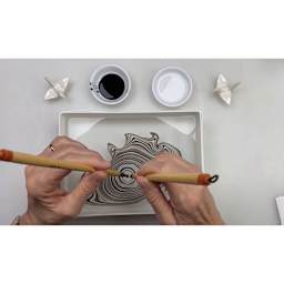 Yasutomo Suminagashi Kit, applying ink to water surface