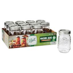 Ball Mason Jars and Lids - 16 oz, Regular Mouth, Pkg of 12, one jar in front of packaging