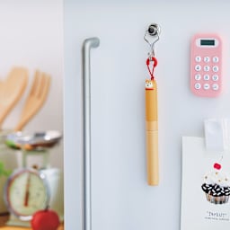 PuniLabo Stick Scissors - Shiba Dog (hanging from a hook on a cabinet)