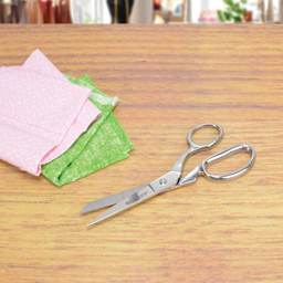  Westcott Hot Forged Heavy Duty Bent Scissor beside cut textiles