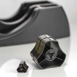 Officemate Dual Roll Tape Dispenser - Replacement Cores beside tape dispenser (not included)