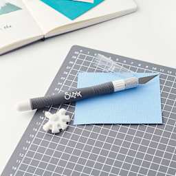 Sizzix Multi-Tool Starter Kit (Shown with paper and cutting mat)