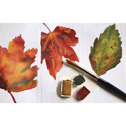 Natural Earth Paint Natural Watercolors Kit - paints beside brush painting leaves
