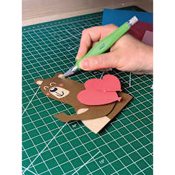 Excel Blades FitGrip Knife - Artist cutting out cartoon bear using Green knife