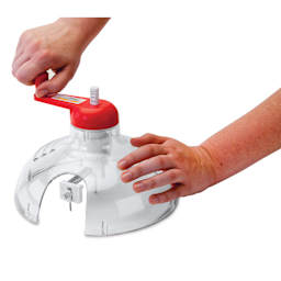 Logan Cos-Tools Circle Cutter, hand holding cutter and crank 