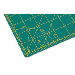 Olfa Self-Healing Rotary Cutting Mat - Green, 12" x 18", close-up of the gridlines