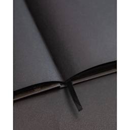 Cognitive Surplus Dark Matter Notebook, close-up of paper