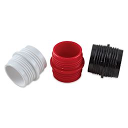 Close-up of 3 Olo Connector Rings - White, Red, and Black