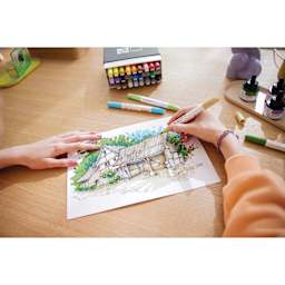 Pantone Dual Tip Markers being used to draw a house