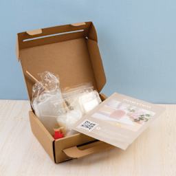 John Bead Rainbow Arch Candle Making Kit contents within packaging