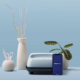 Cricut EasyPress 3 - Zen Blue, 9" x 9" - on table with cricutheat app open