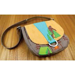 PA Essentials Stencil - Bigfoot, leather bag decorated with the stencil art